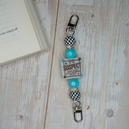 E-Reader/Phone Strap -  Suspect Claims She's Laid Back (Interchangeable)