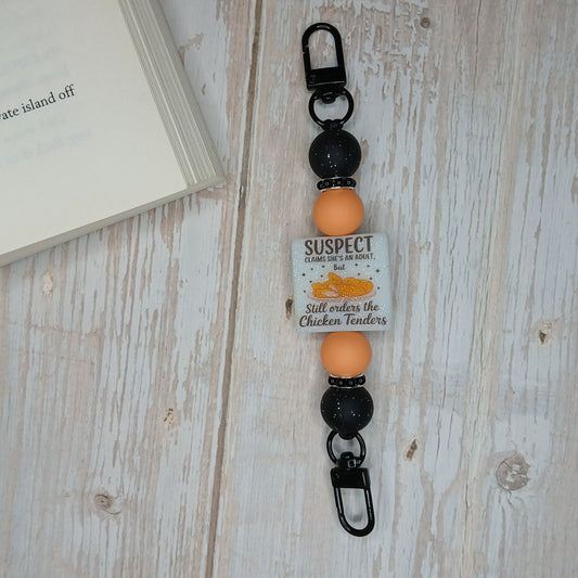 E-Reader/Phone Strap -  Suspect Claims She's An Adult - Chicken Tenders (Interchangeable)