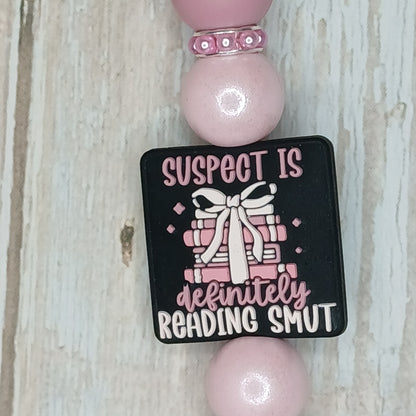E-Reader/Phone Strap -  Suspect is Definitely Reading Smut (Interchangeable)